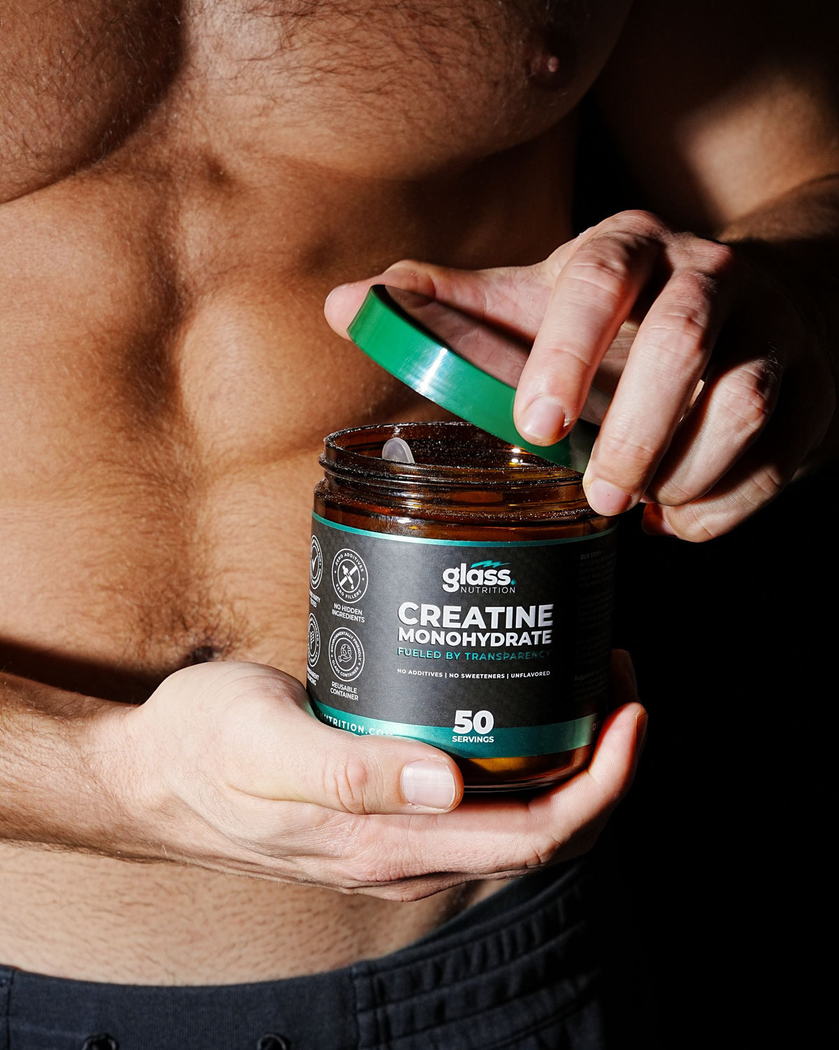 Opening a jar of Glass Nutrition Creatine Monohydrate