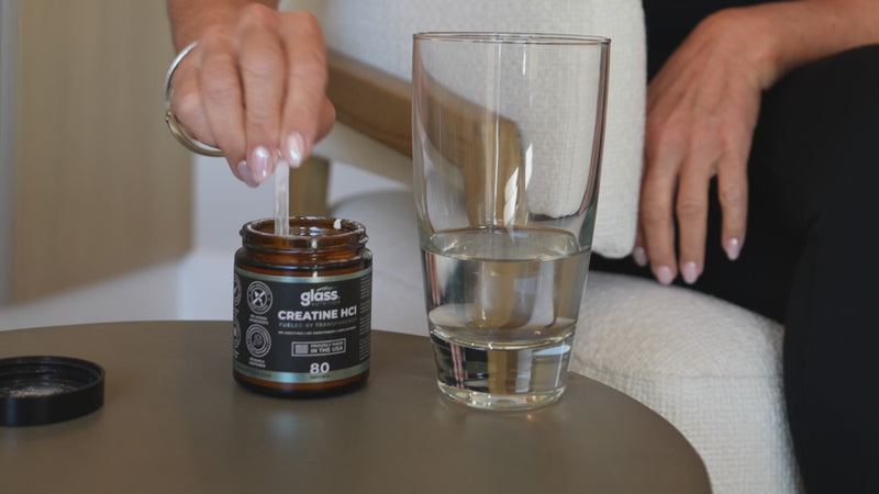 Video of woman pouring creatine in water